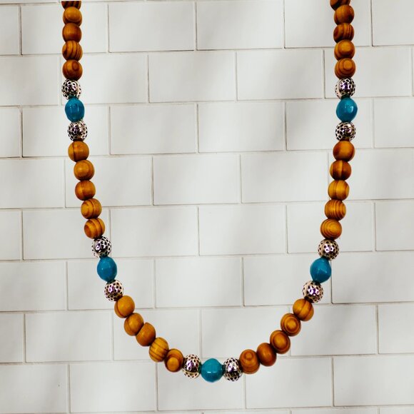 Wood bead necklace created with turquoise color beads and textured silver beads. - Picture 8 of 11
